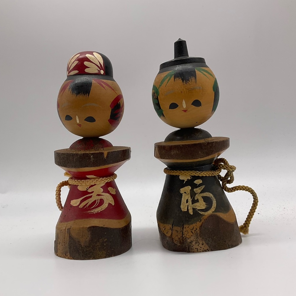 TWO VINTAGE HAND PAINTED KOKESHI DOLLS